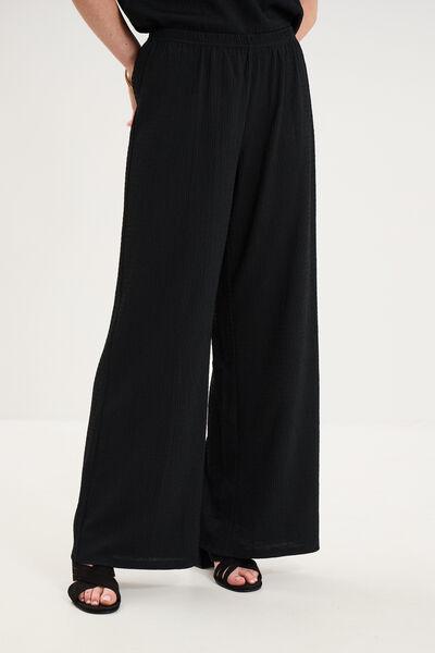 Pantalon effet gaufr&eacute; fluide noir femme