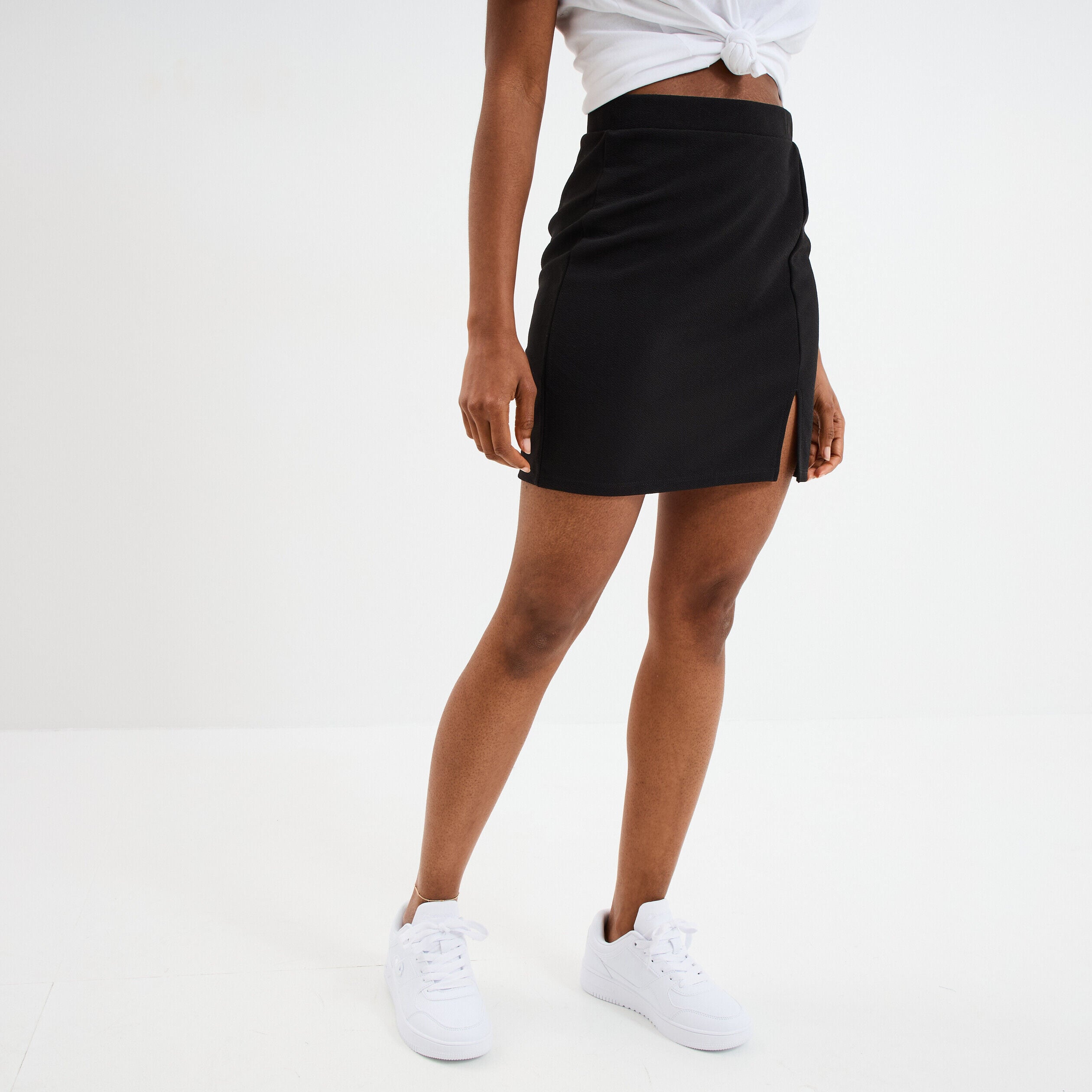 Jupe courte ajustée fendue noir femme LH