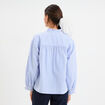 Blouse boutonnée col montant bleu ciel femme