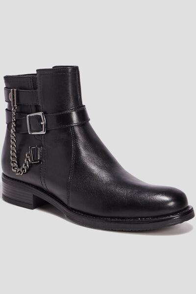 Bottines avec boucles en cuir noir femme