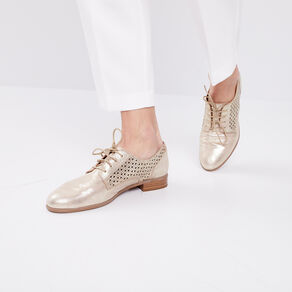 Derbies perforées en cuir jaune or femme