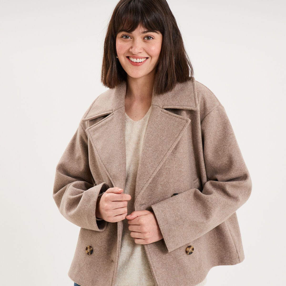 Manteau court double boutonnage beige femme
