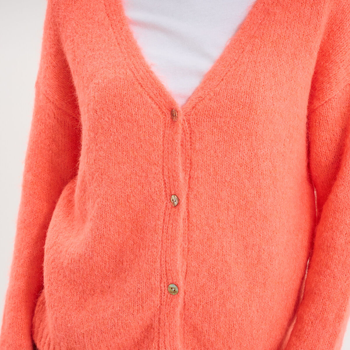 Gilet col en V manches longues rose fluo femme