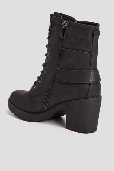 Bottines à talons et boucles noir femme