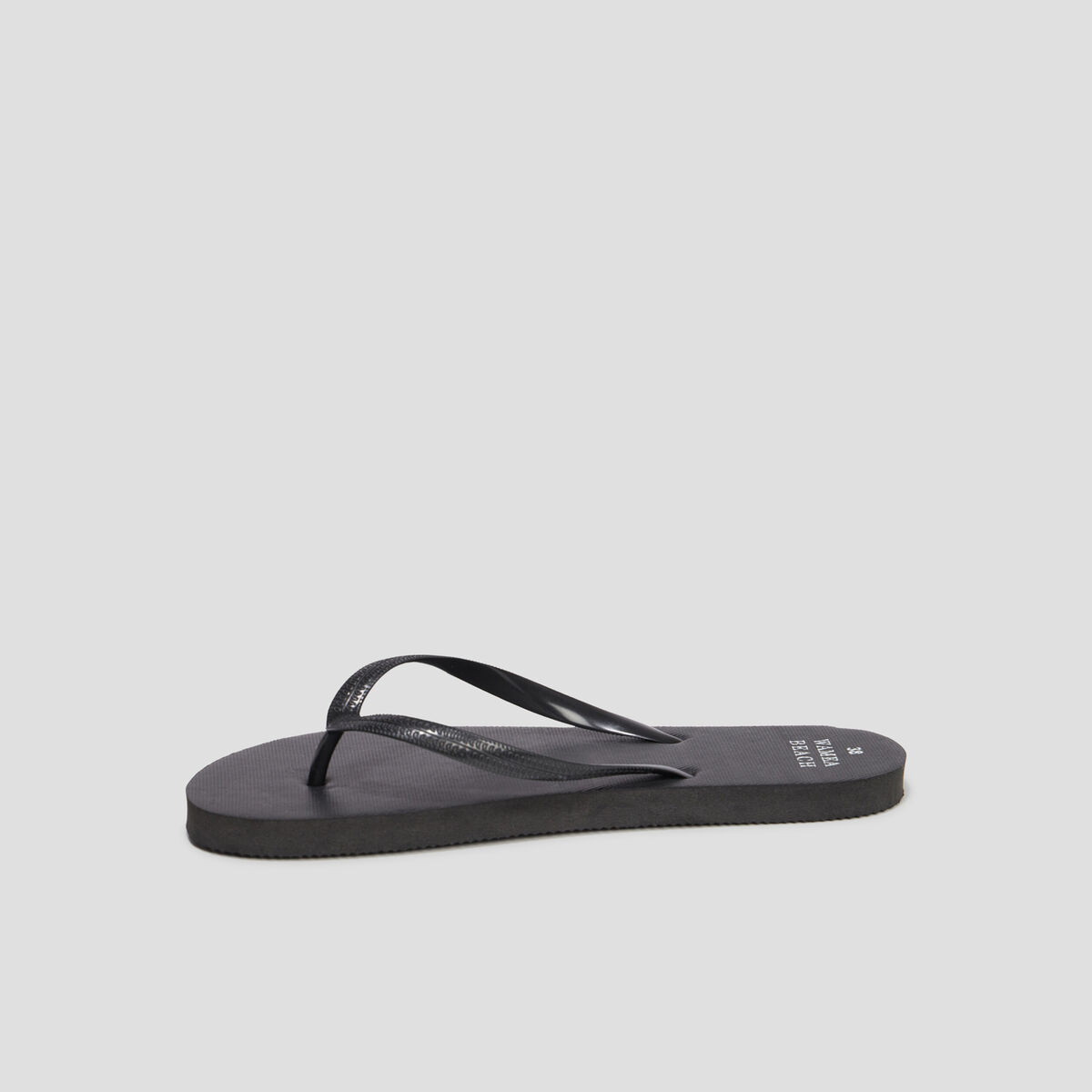 Tongs semelle plate noir femme