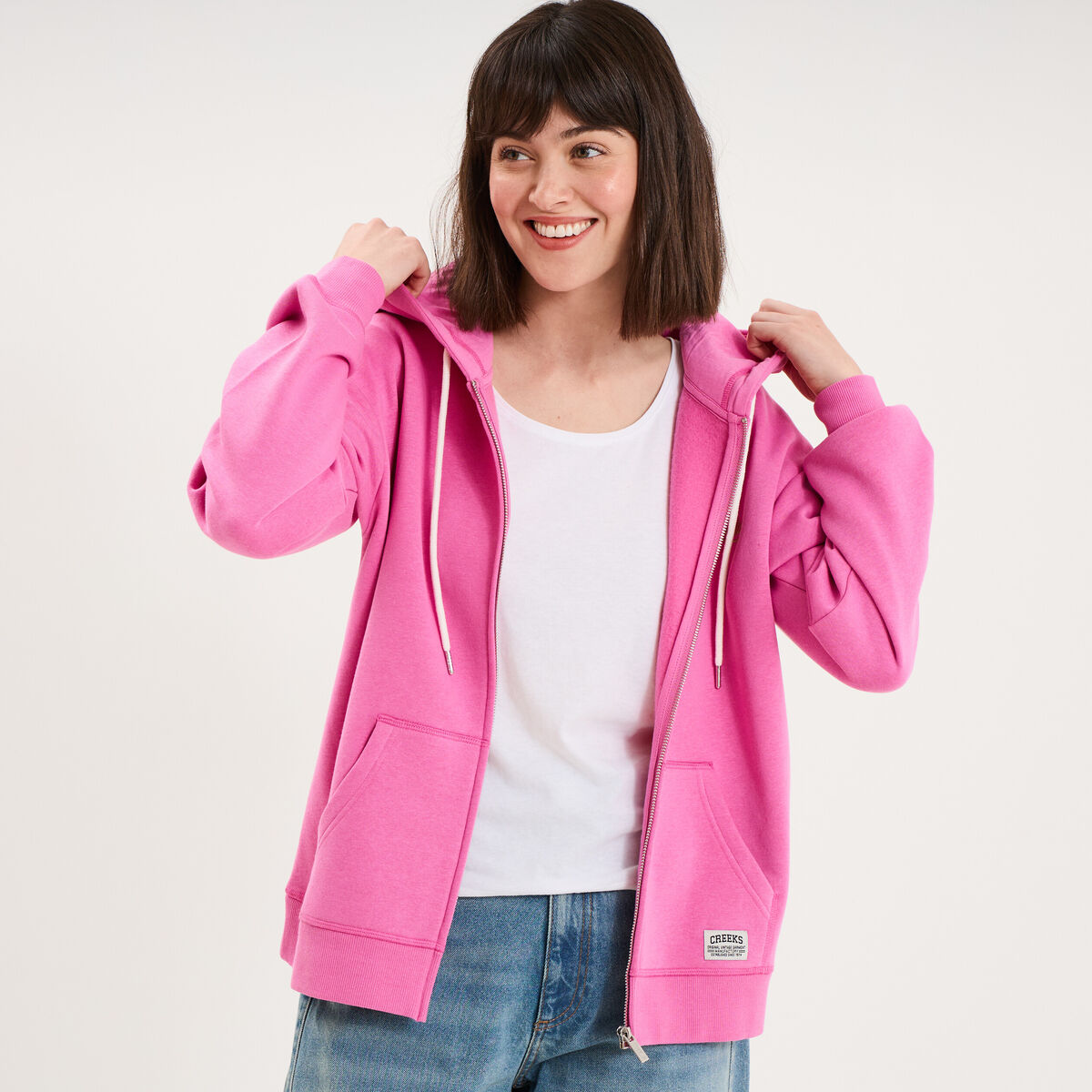Sweat zipp&eacute; &agrave; capuche rose fushia femme