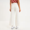 Jean large cropped poches plaqu&eacute;es coton ivoire femme