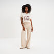 Pantalon large avec ceinture beige femme