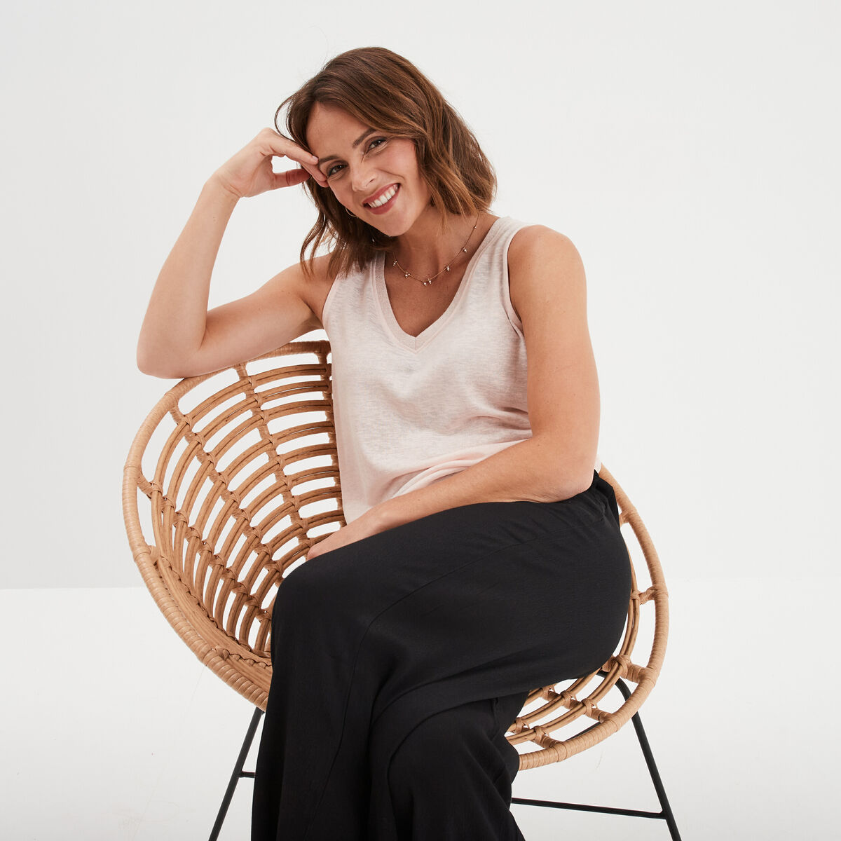 Débardeur col en V sans manches rose clair femme