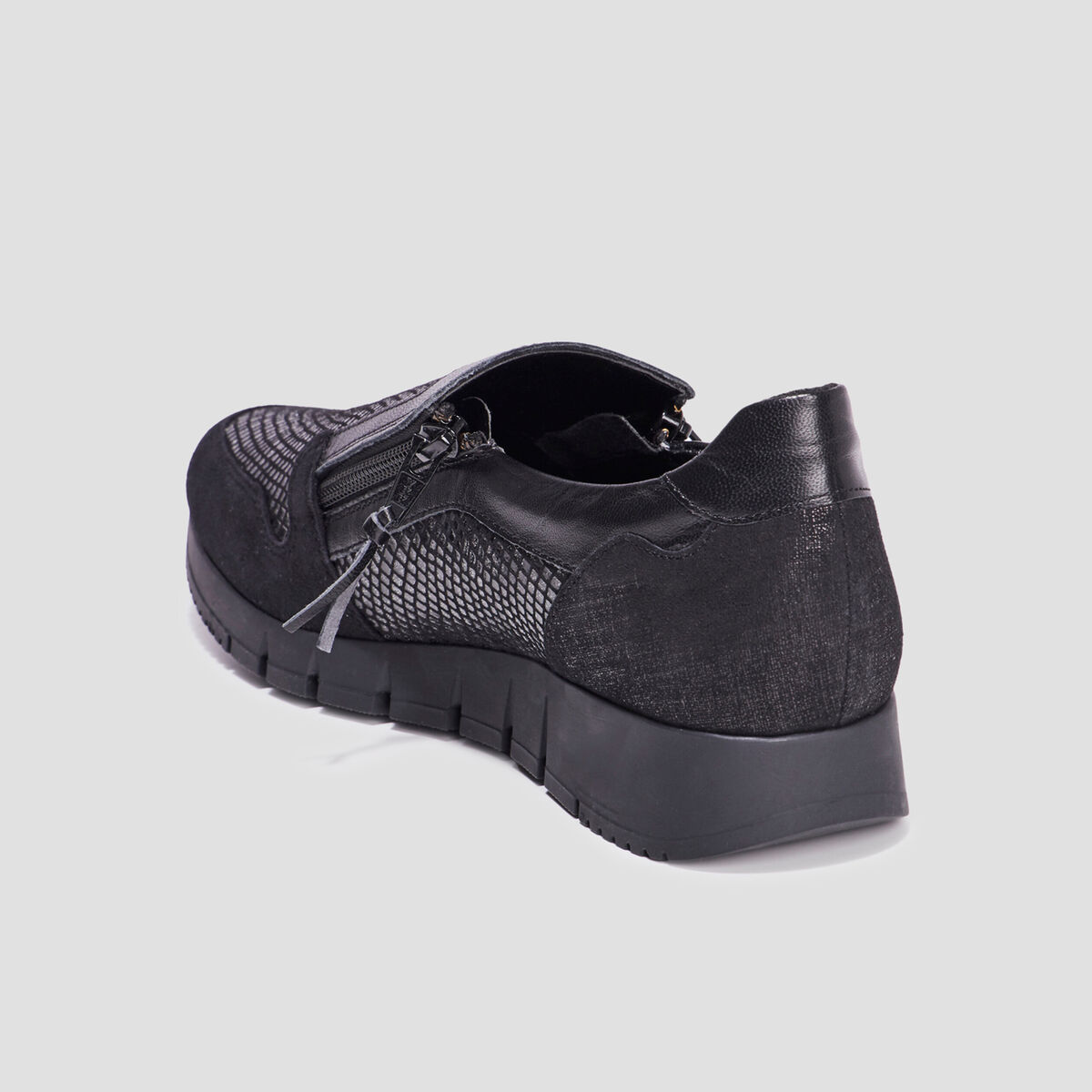 Baskets zippées en cuir pied large noir femme
