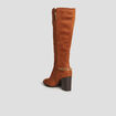 Bottes hautes détails chaînes à talons marron cognac femme