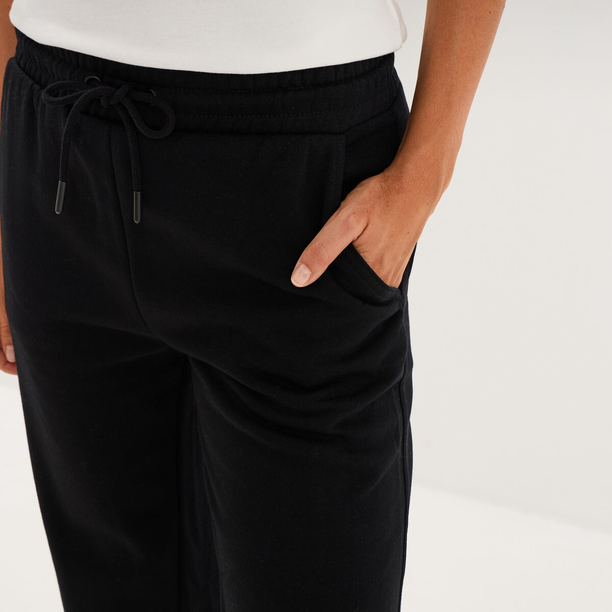 Pantalon de jogging molletonn&eacute; noir femme