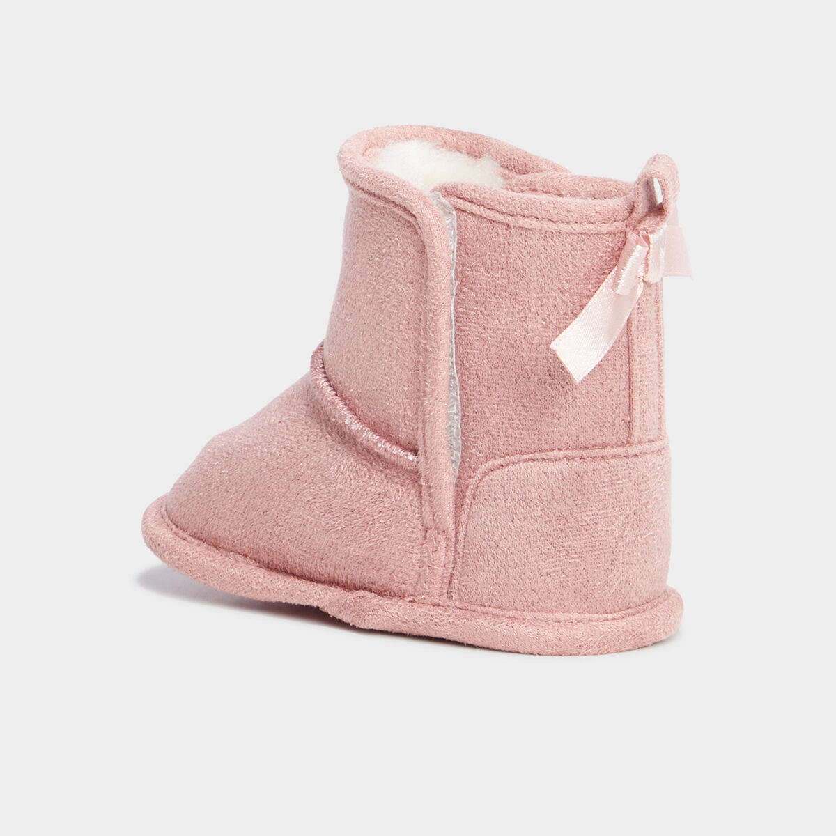 Bottons fourrés à scratchs et noeuds rose bébé fille