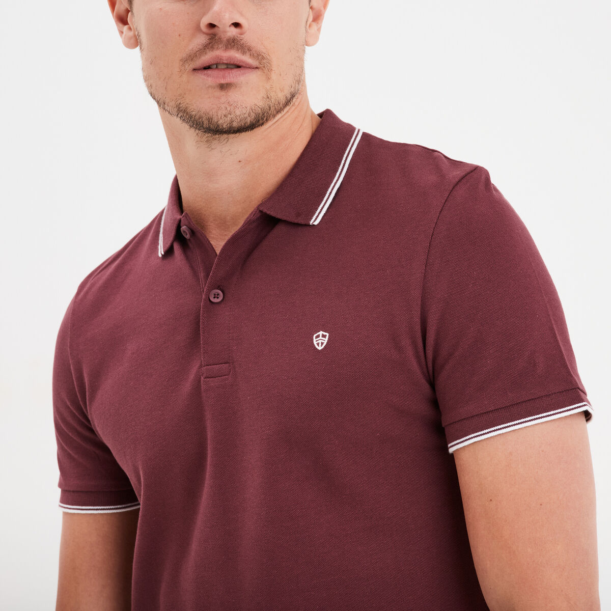Polo manches courtes bords contrastés prune homme