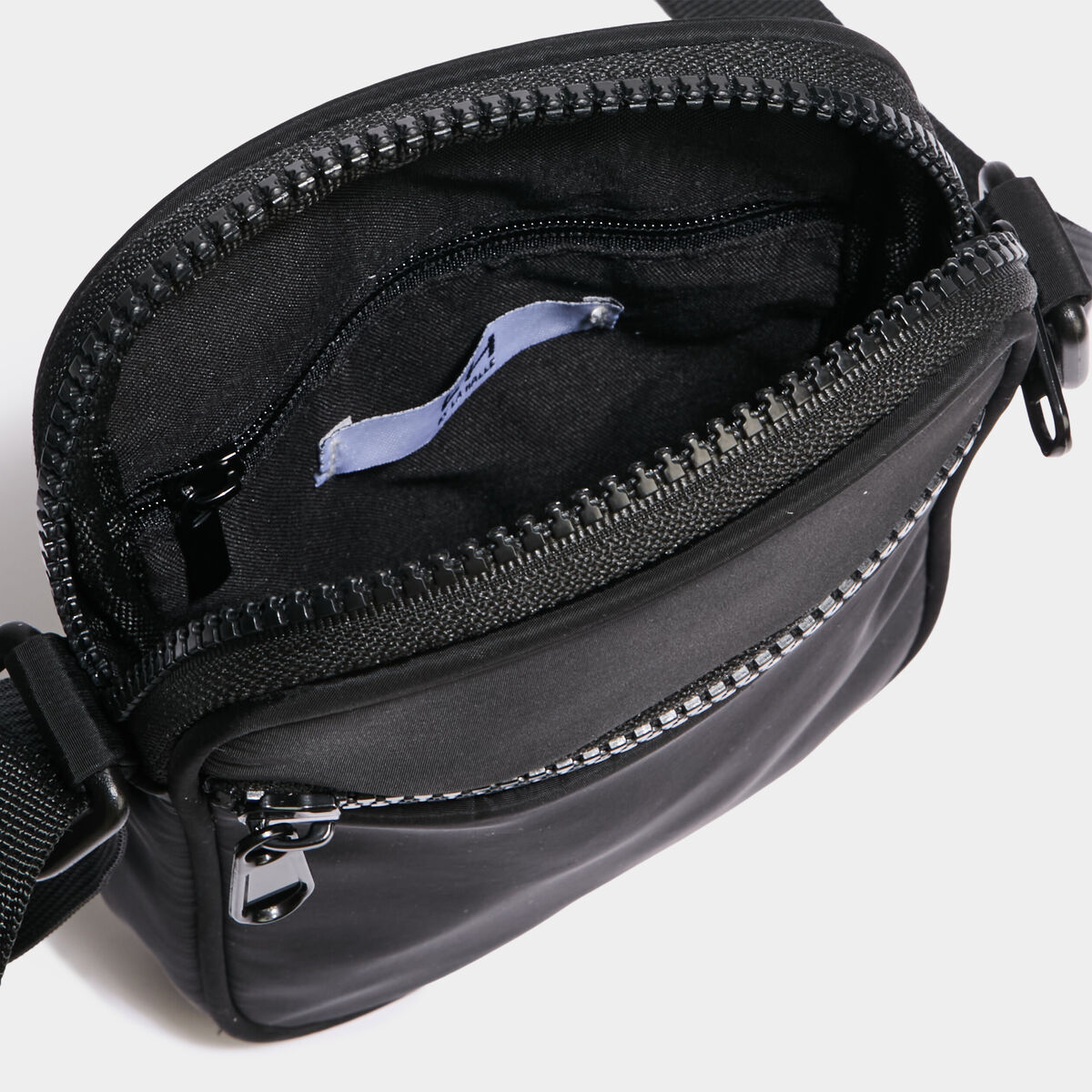 Sac pochette en bandouli&egrave;re noir femme