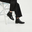 Bottines plates avec strass et boucles noir femme