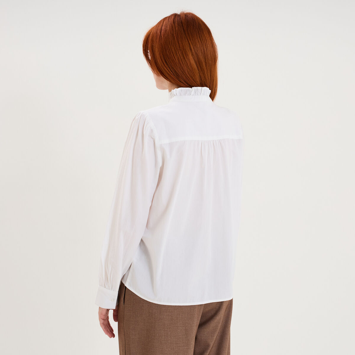 Blouse manches longues col montant blanc femme