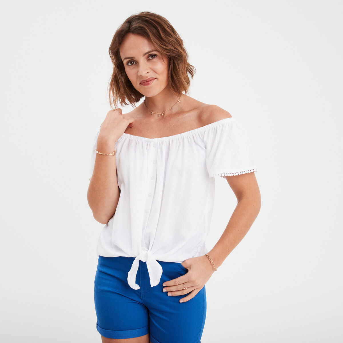 Blouse manches courtes avec noeud blanc femme