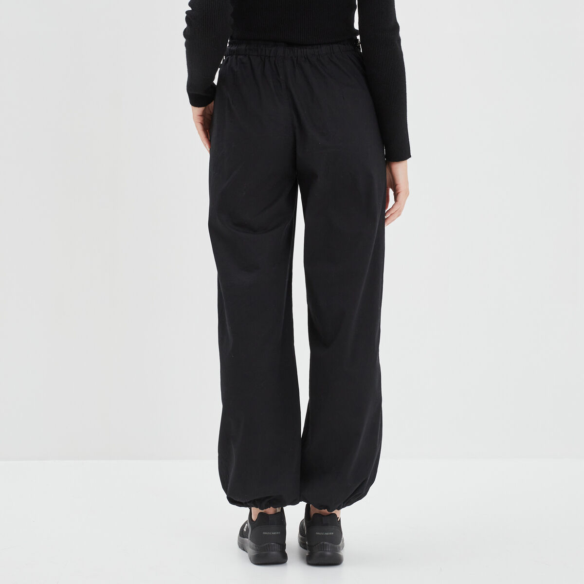 Pantalon loose bas resserré noir femme