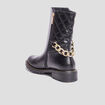 Bottes matelassées avec chaînes noir femme