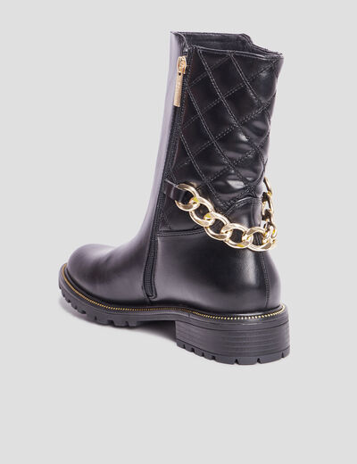 Bottes matelassées avec chaînes noir femme
