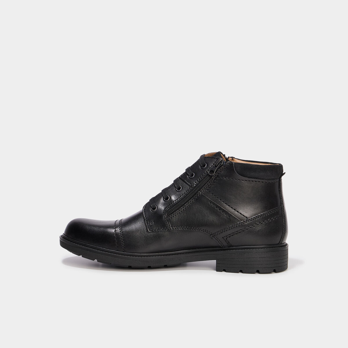Bottines montantes zipp&eacute;es en cuir noir homme