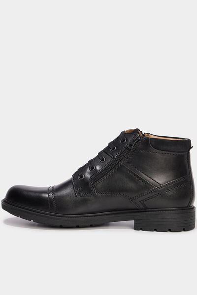 Bottines montantes zipp&eacute;es en cuir noir homme