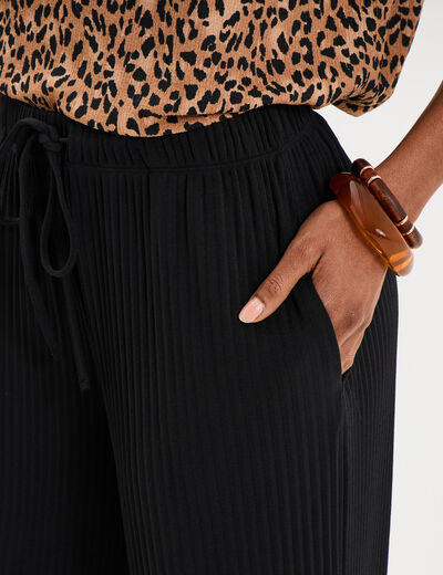 Pantalon effet pliss&eacute; large noir femme