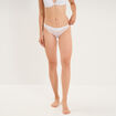 Tanga en dentelle avec noeud blanc femme