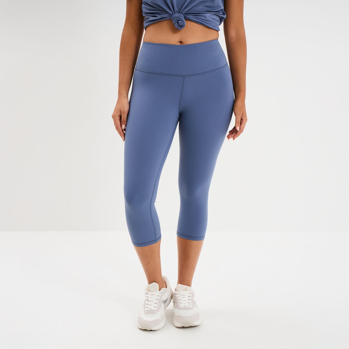 Legging corsaire de sport stretch bleu fonc&eacute; femme
