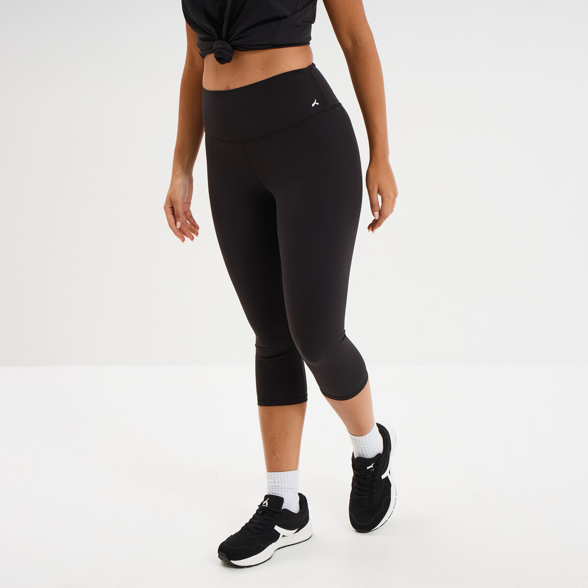 Legging corsaire de sport stretch noir femme