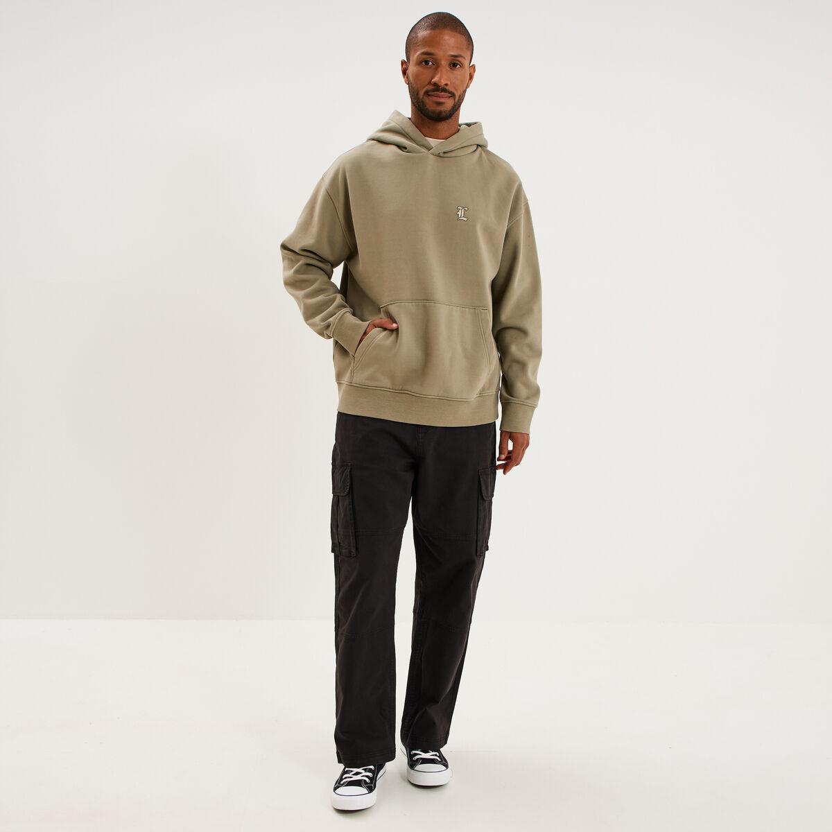 Pantalon cargo large avec poches c&ocirc;t&eacute;s noir homme