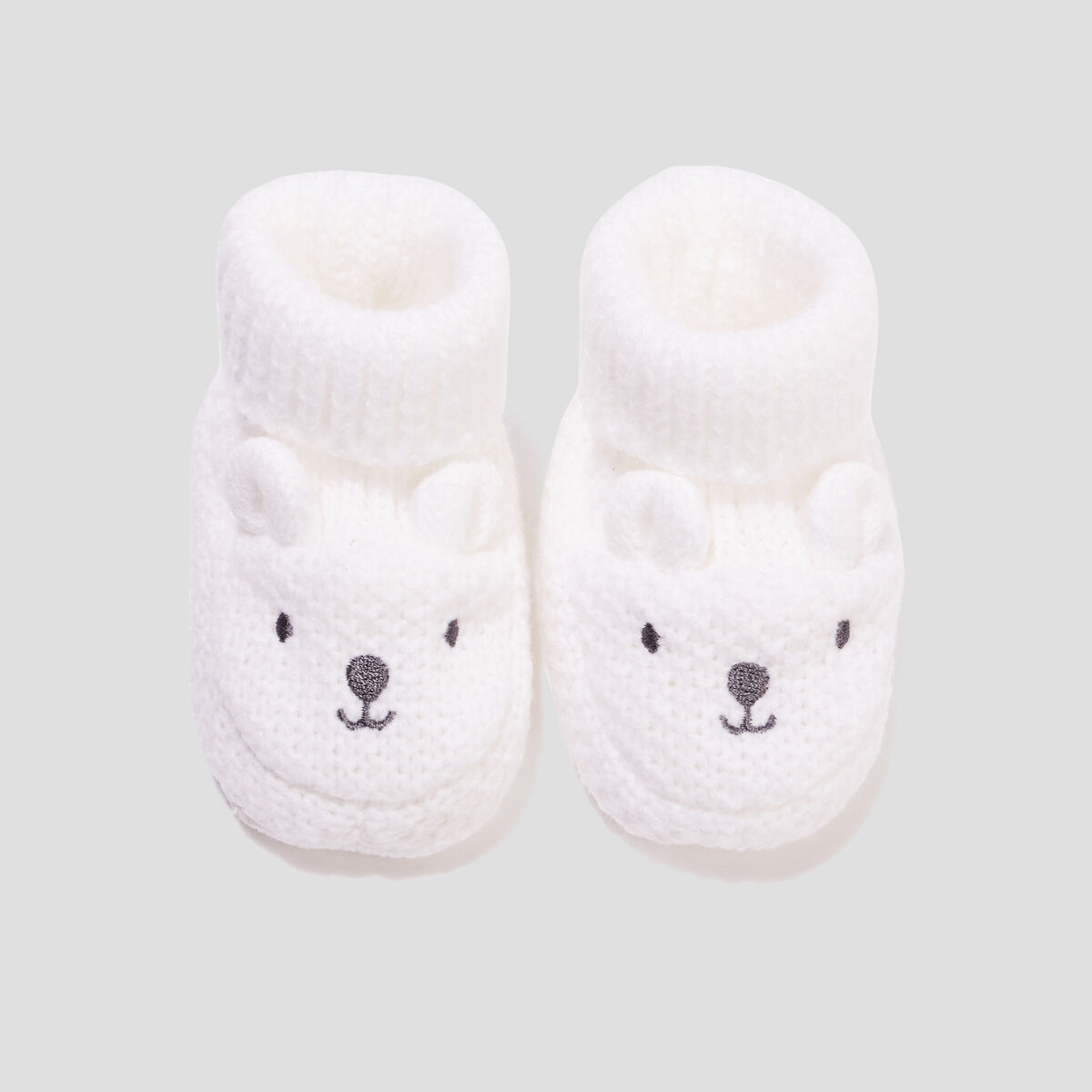 Chaussettes d'intérieur tricotées ivoire bébé fille