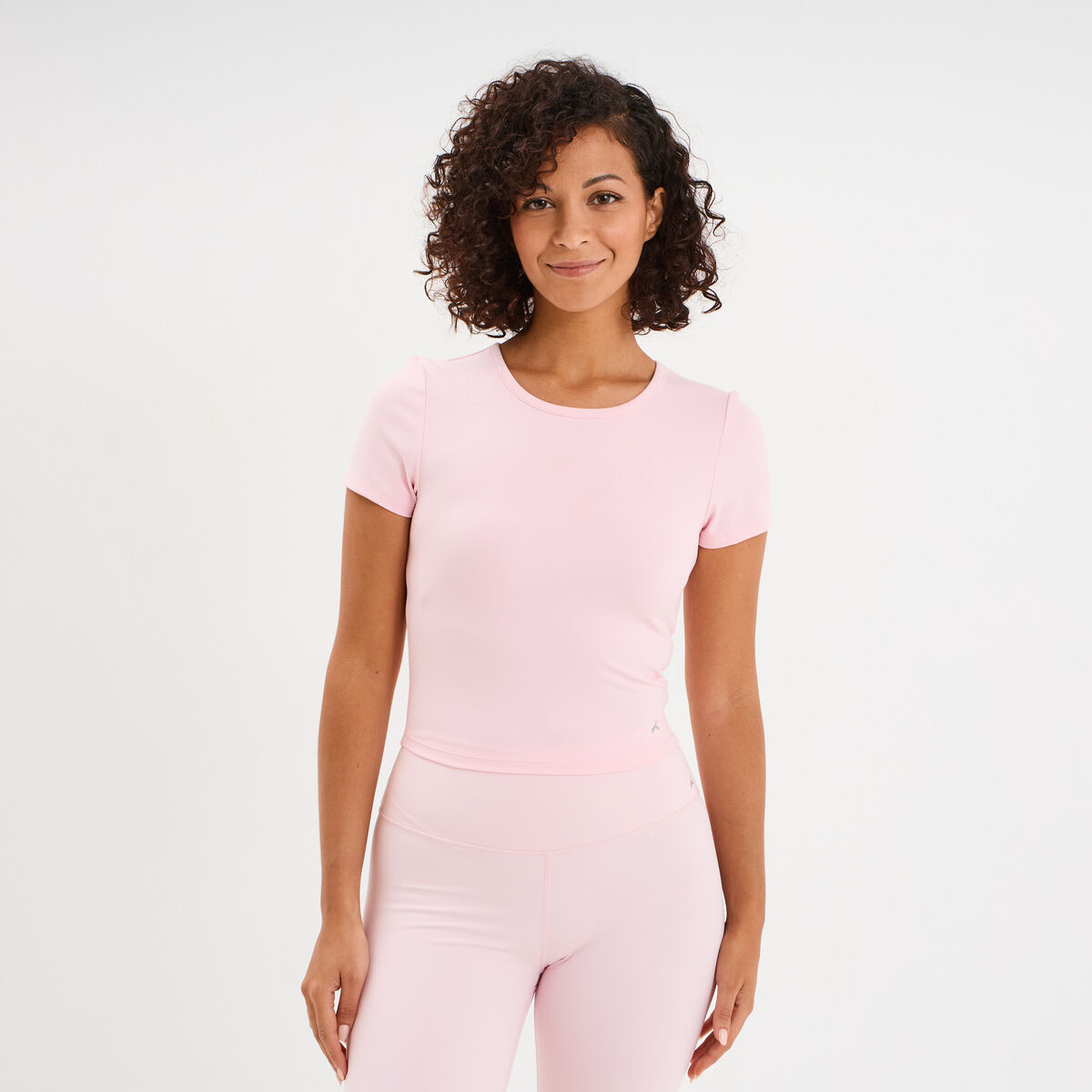 T-shirt de sport court ajust&eacute; rose clair femme