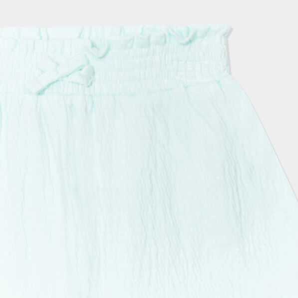 short fluide taille smockee bleu pastel bebef Short fluide taille smockée bleu pastel bébé fille