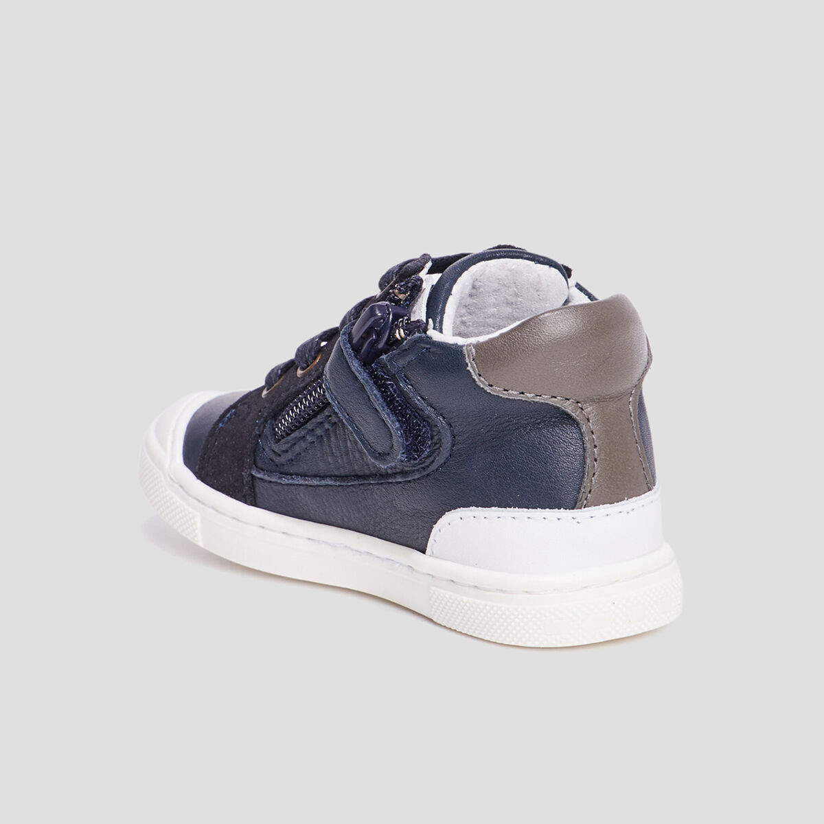 Bottillons zipp&eacute;s en cuir bleu marine b&eacute;b&eacute; gar&ccedil;on