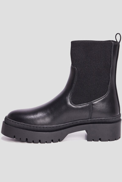 Bottines ranger crantées noir femme