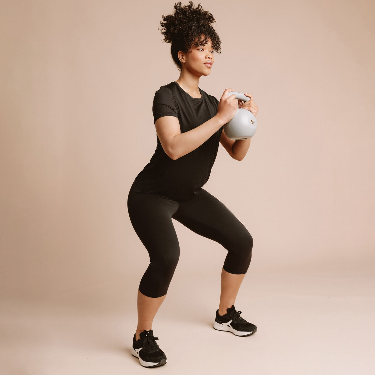 Legging corsaire de sport stretch noir femme