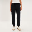 Pantalon de jogging molletonn&eacute; noir femme