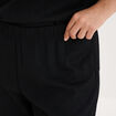 Pantalon effet gaufr&eacute; fluide noir femme grande taille