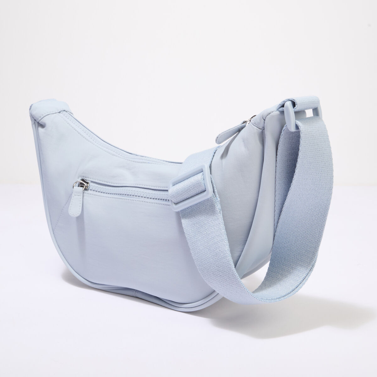 Sac banane en bandouli&egrave;re bleu ciel femme