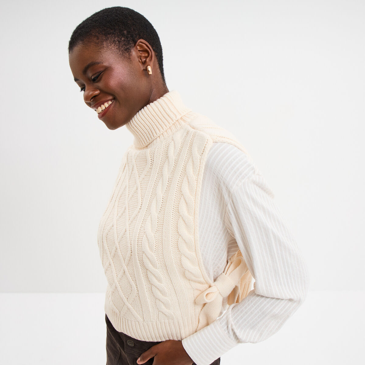 Pull gilet noeuds col roulé sans manches sable femme