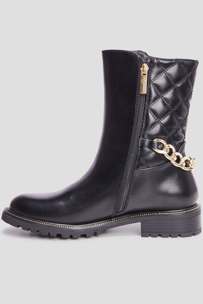 Bottes matelassées avec chaînes noir femme