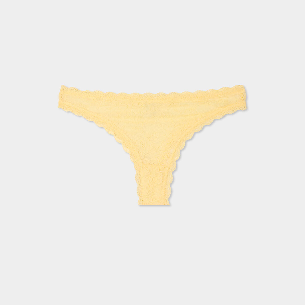 Tanga en dentelle doublure coton jaune clair femme