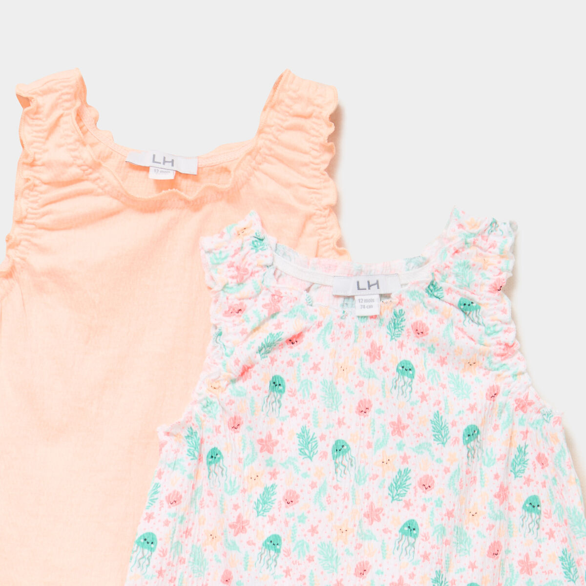 Lot 2 d&eacute;bardeurs droits cols ronds blanc b&eacute;b&eacute; fille