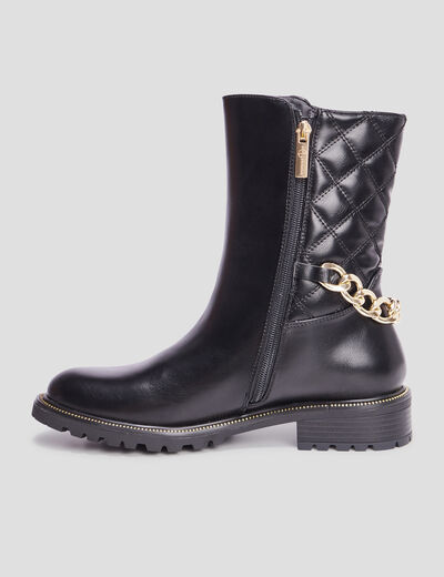 Bottes matelassées avec chaînes noir femme