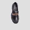 Mocassins à talons et détails chaînes noir femme