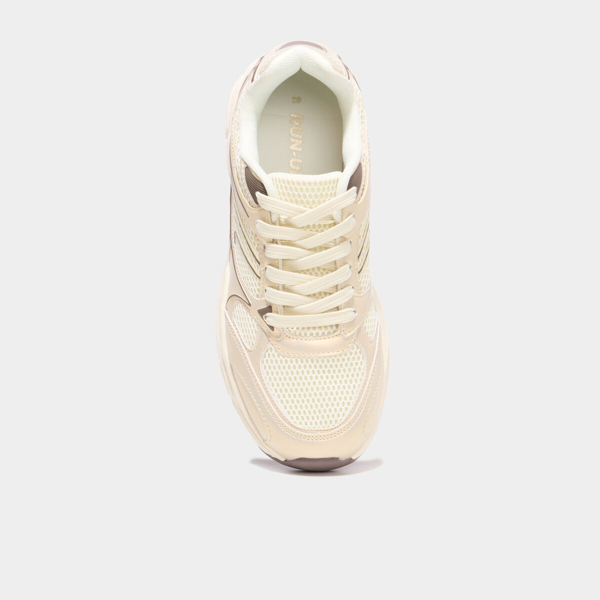 Baskets running sable femme
