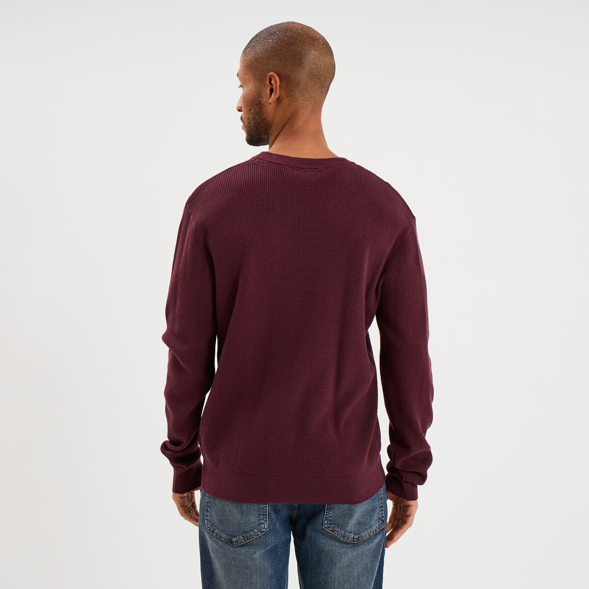 Pull en maille textur&eacute;e col rond prune homme
