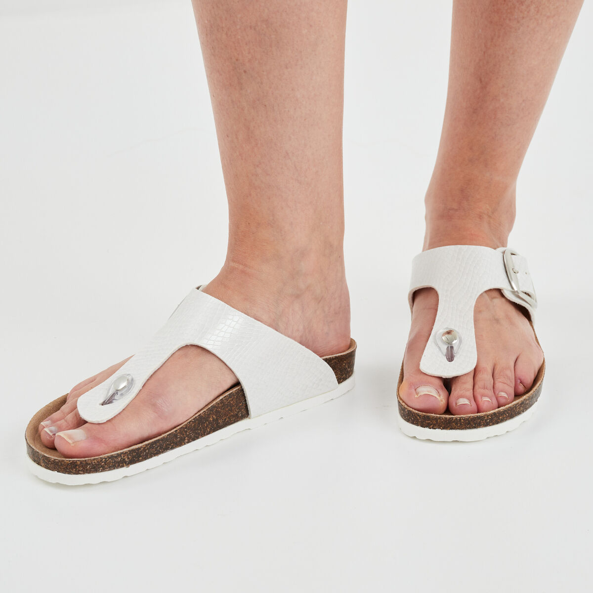 Mules plates entredoigts blanc femme